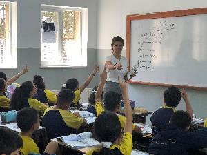 YAGM volunteers teaching in ELCJHL School. Photo credit: Meghan Aelabouni.
